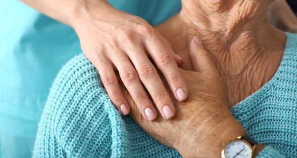 Doctor Supporting Woman in Incontinence Treatment
